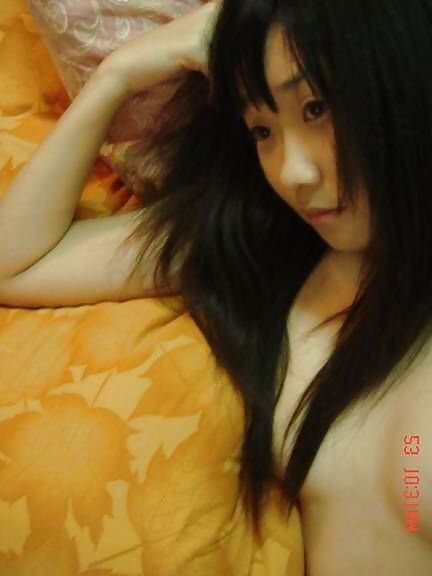 Selfmade pics of hot Asian naked at home