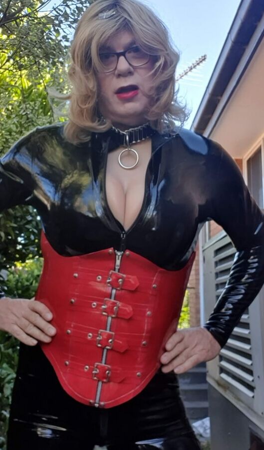 Rachel Wears a Catsuit and a Red Corset