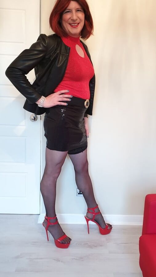 Leather jacket and pink sissy chastity for TGirl Lucy