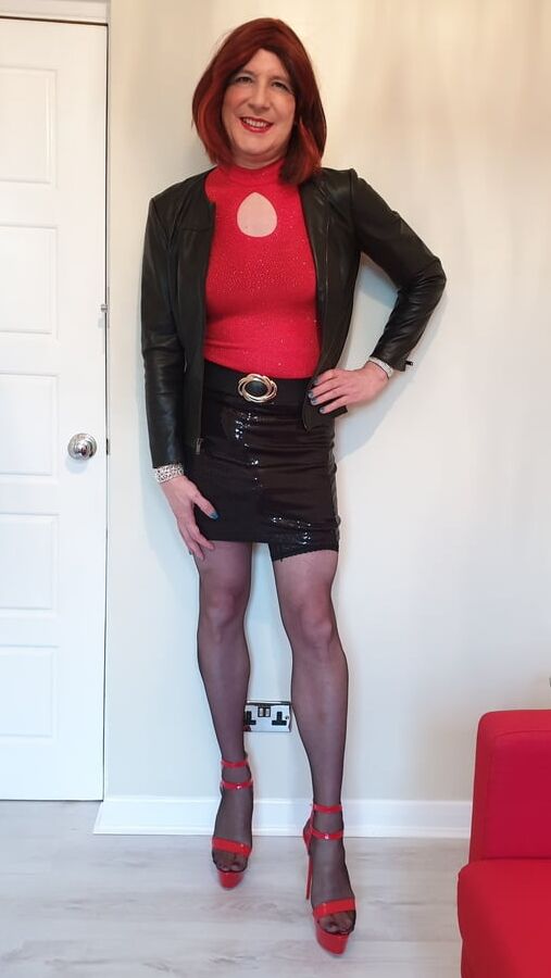 Leather jacket and pink sissy chastity for TGirl Lucy