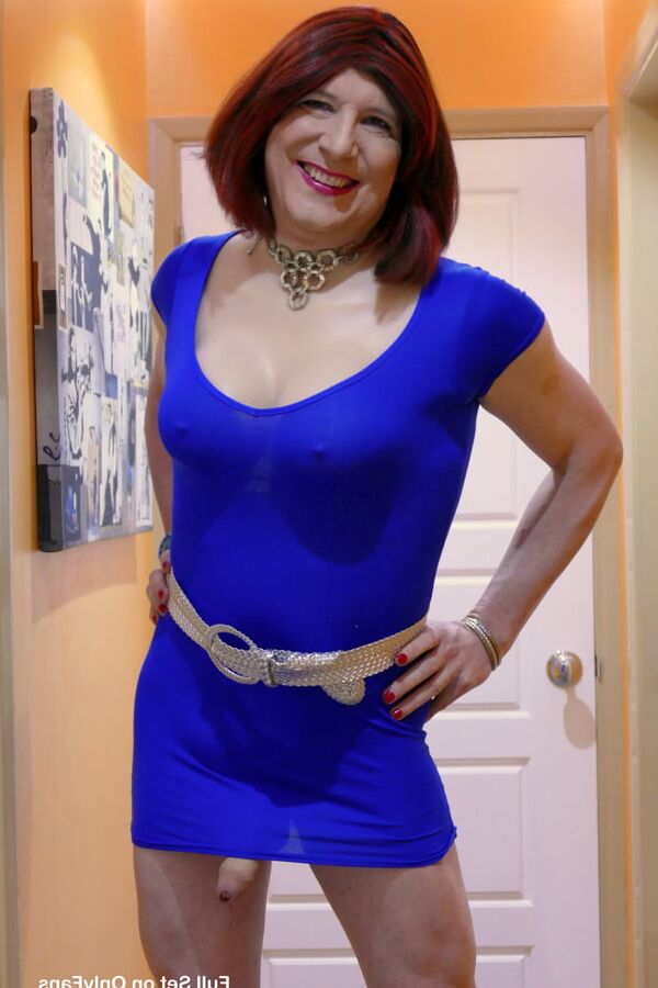 Sissy Lucy showing off big cock and tits in tight blue dress