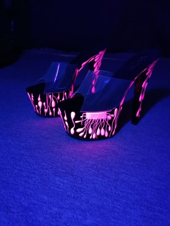 Sexy CD Feet On High Heels Posing In Neon Light