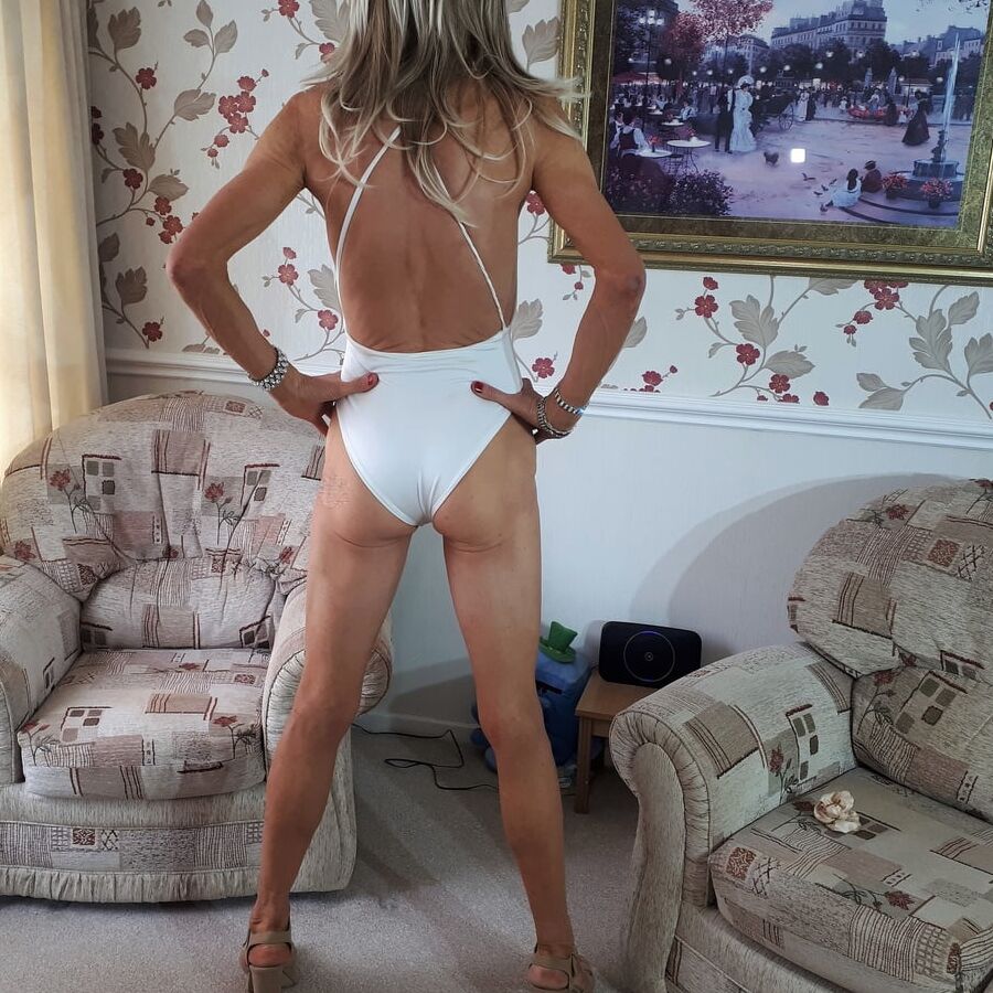 Alessia models fun and sexy white Bride swimsuit