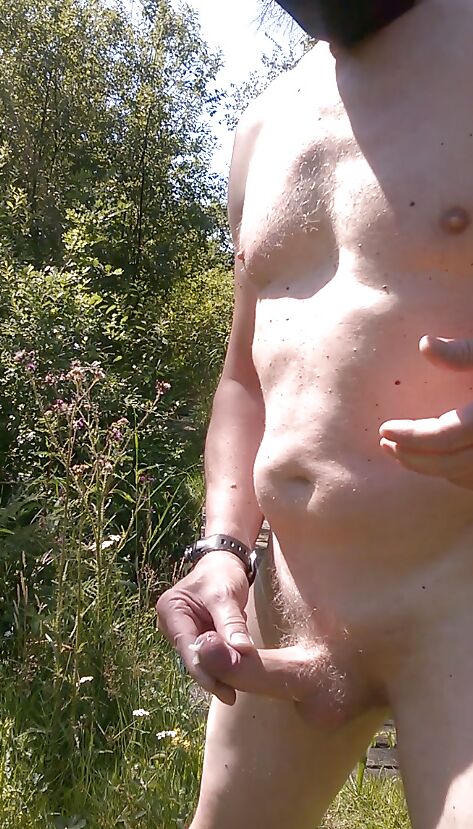 exhibitionist naked cumshot in the woods