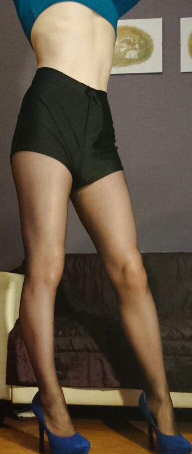 Marie crossdresser in sheer pantyhose and black shorts
