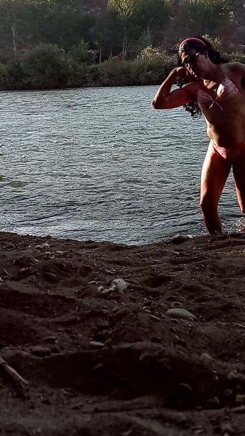 Lexiee playing in the river
