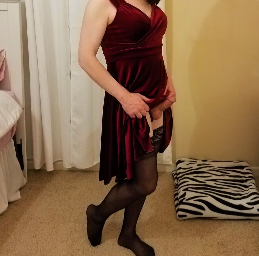 Sissy in a Red Velvet Dress Showing His Hard Little Dick
