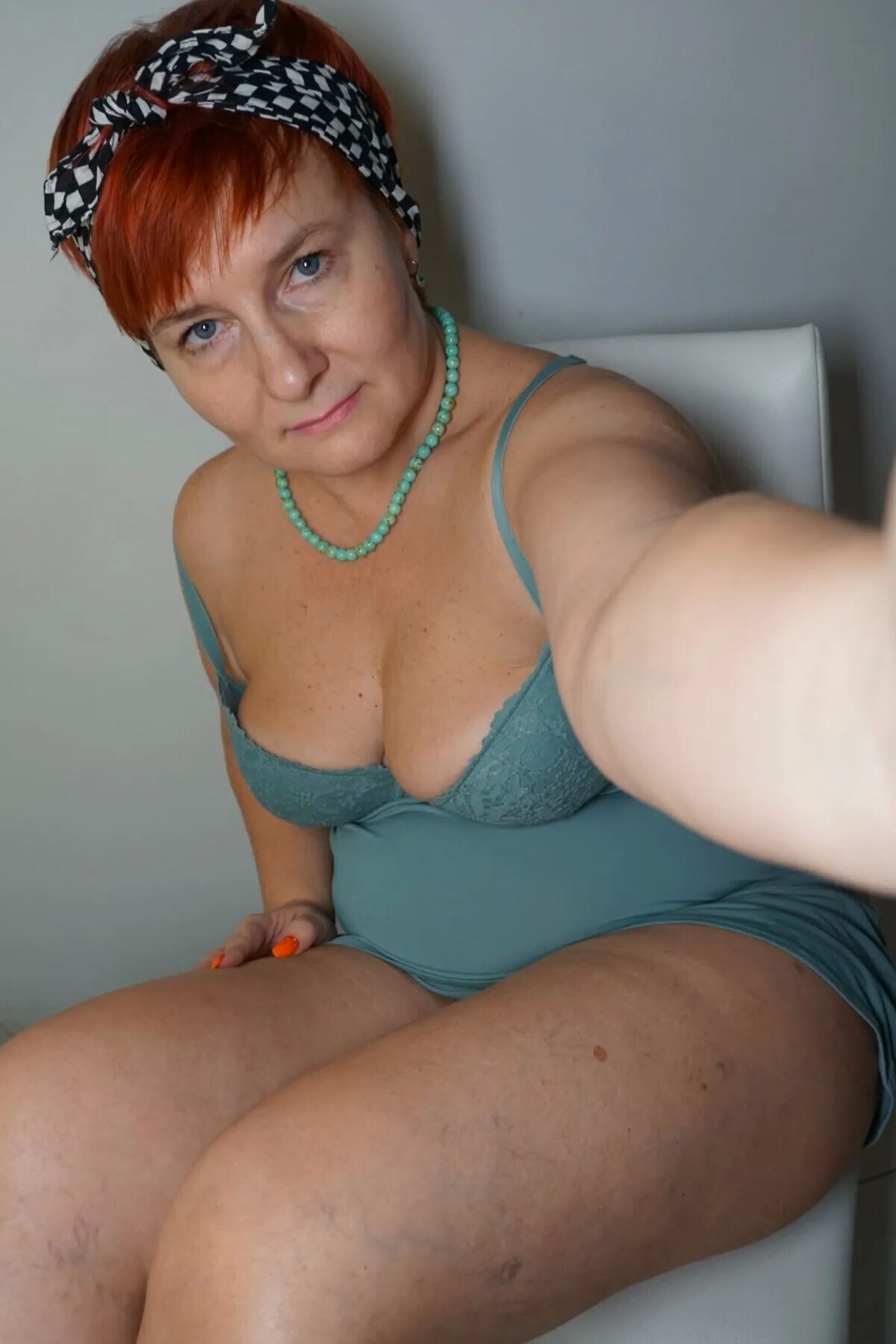 Redhead Gilf Posing In All Kinds Of Lingerie Nudedworld