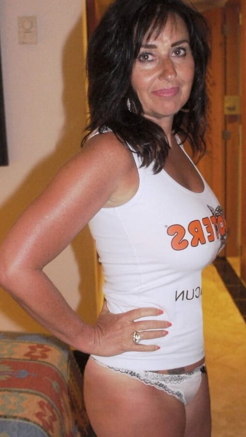 Amazing brunette milf with big tits and nice nipples