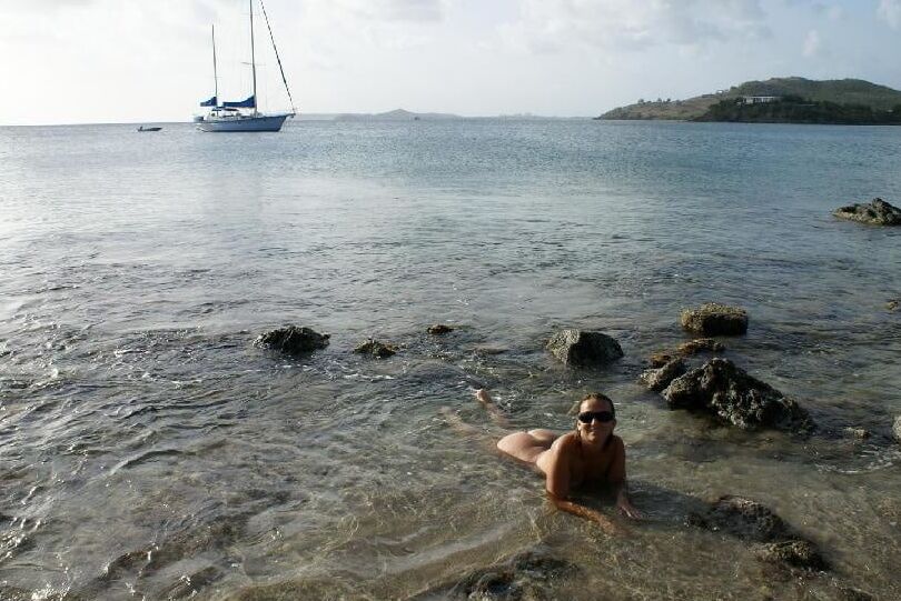 Happy Nudist Couple naked on Holiday Beach