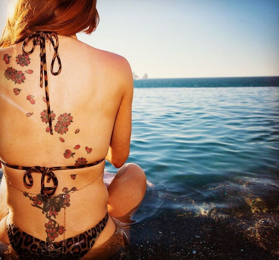 Liz: Redhead tattooed MILF