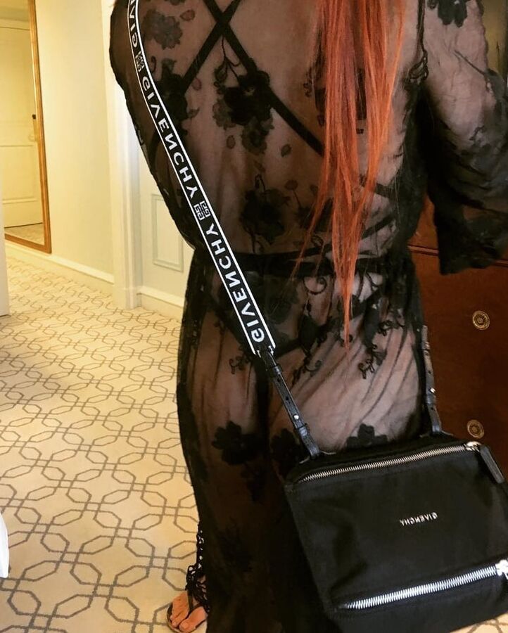 Liz: Redhead tattooed MILF