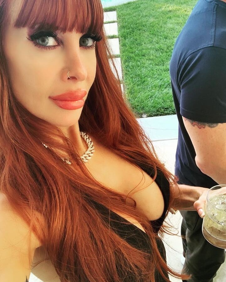 Liz: Redhead tattooed MILF