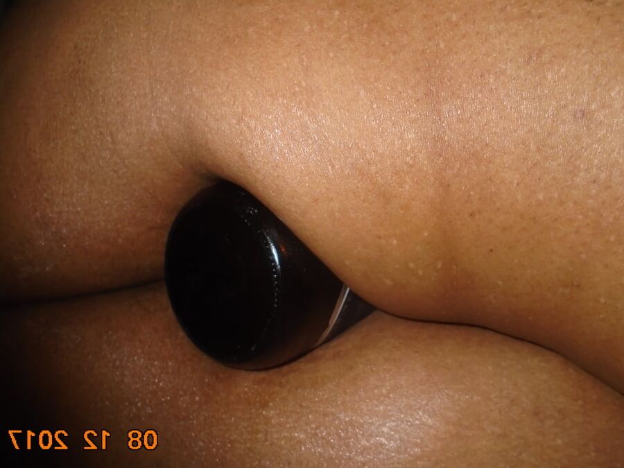 hubby putting bottles in ass and pussy