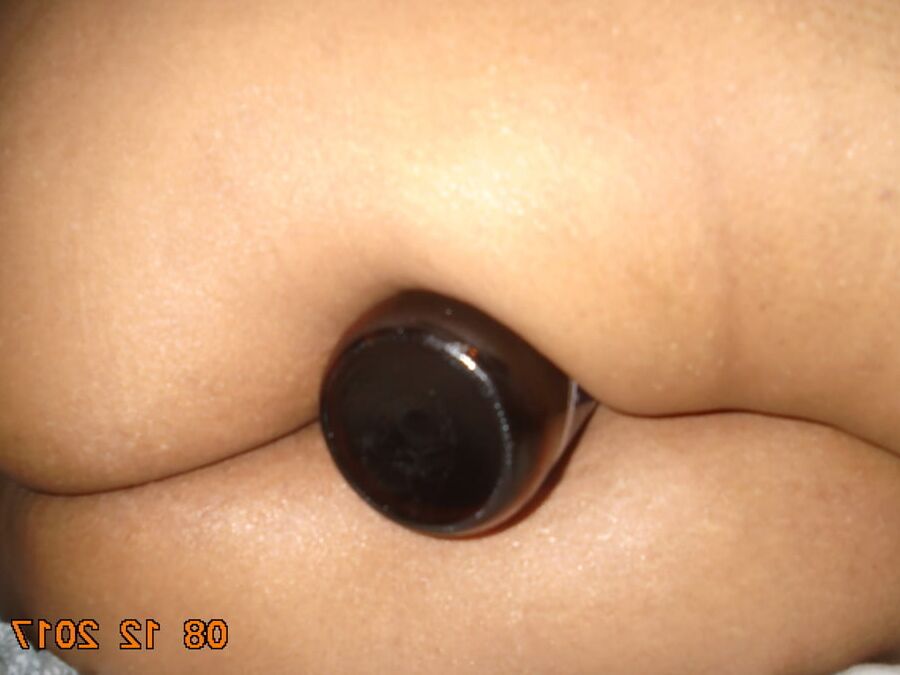 hubby putting bottles in ass and pussy