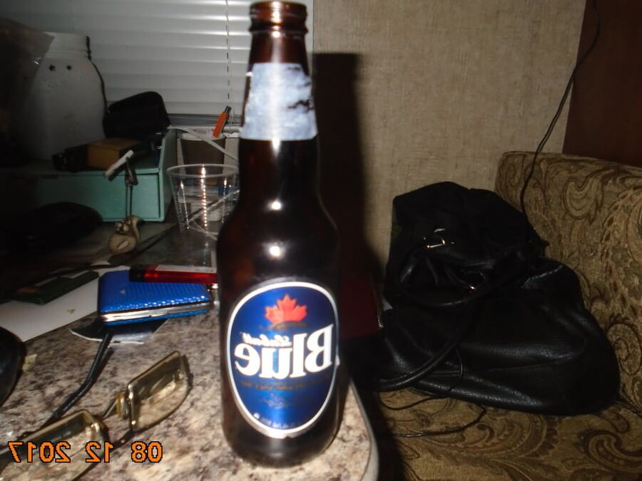 hubby putting bottles in ass and pussy
