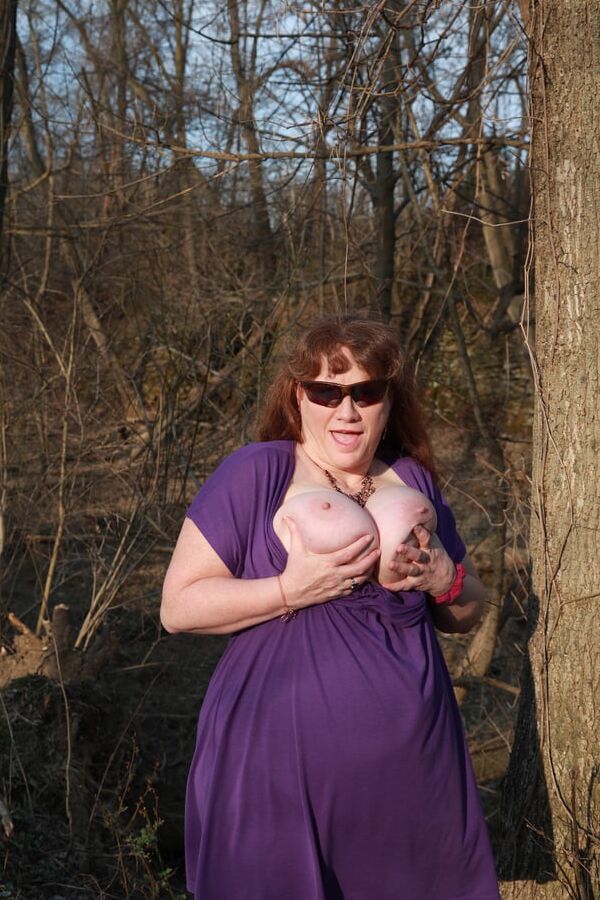 Sally in Purple dress flashing outside