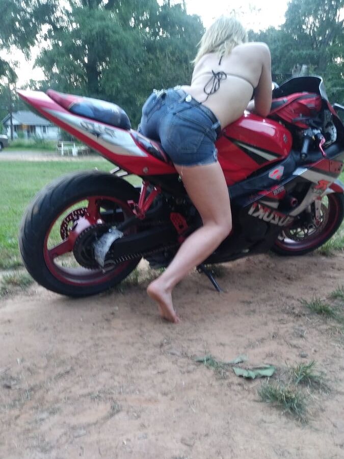 Sexy girl poseing on my bike