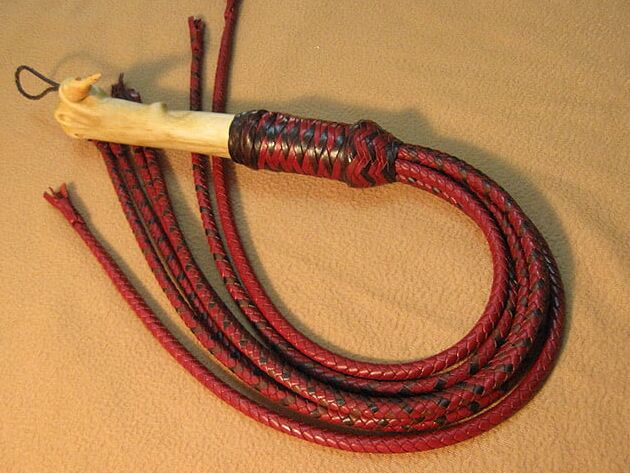 Doctor. Leather flogger