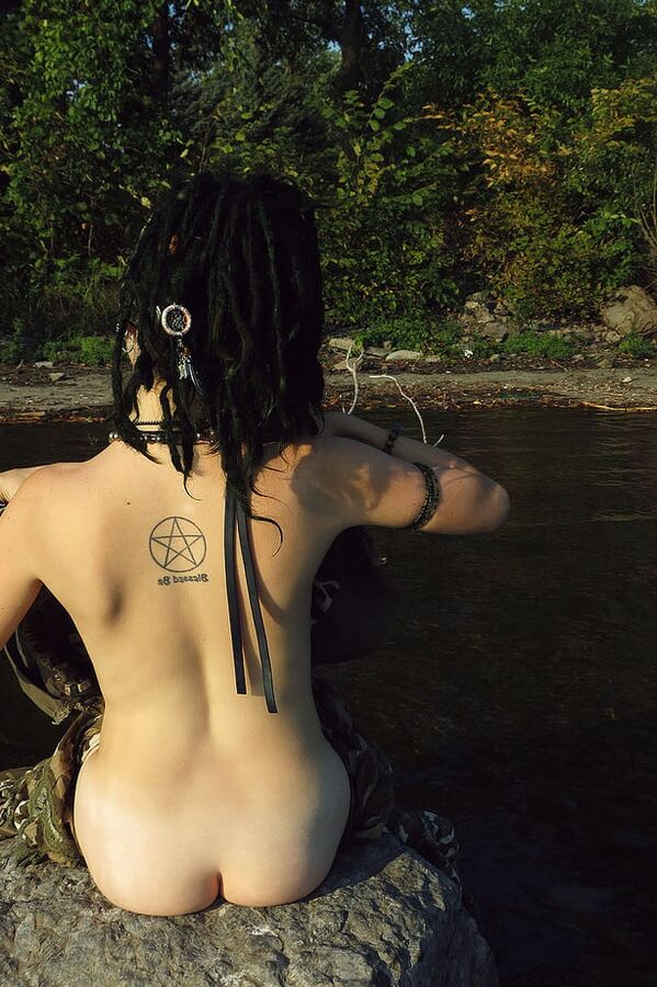 Girl with piercings and tattoos