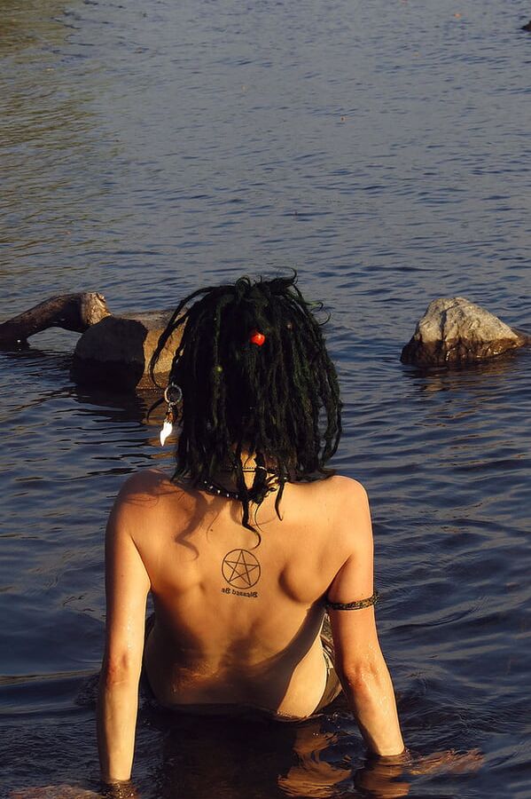 Girl with piercings and tattoos