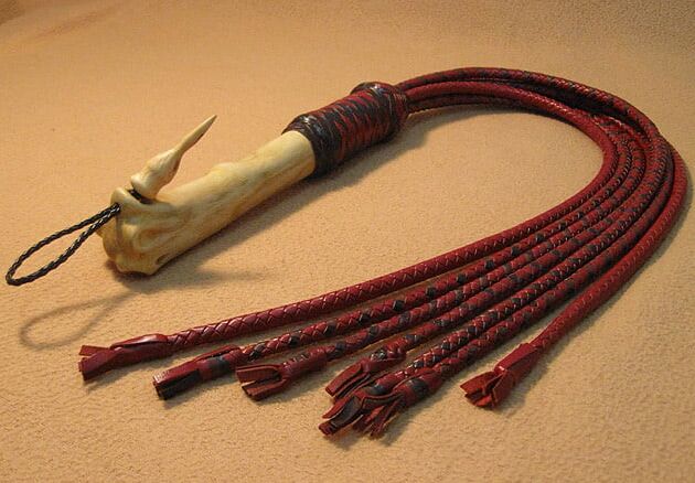Doctor. Leather flogger