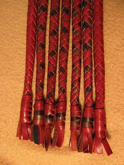 Doctor. Leather flogger