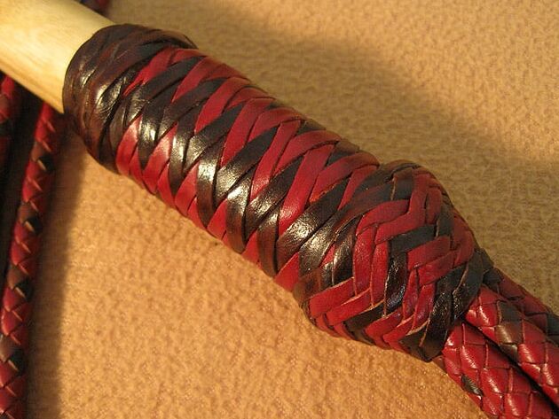 Doctor. Leather flogger