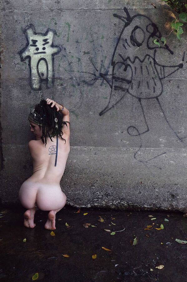Girl with piercings and tattoos