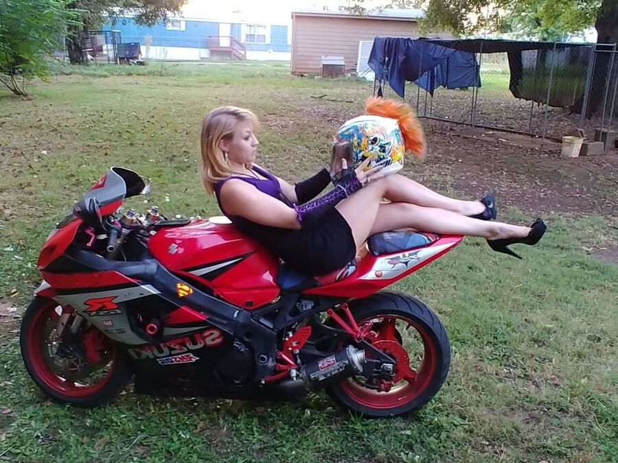 Sexy girl poseing on my bike