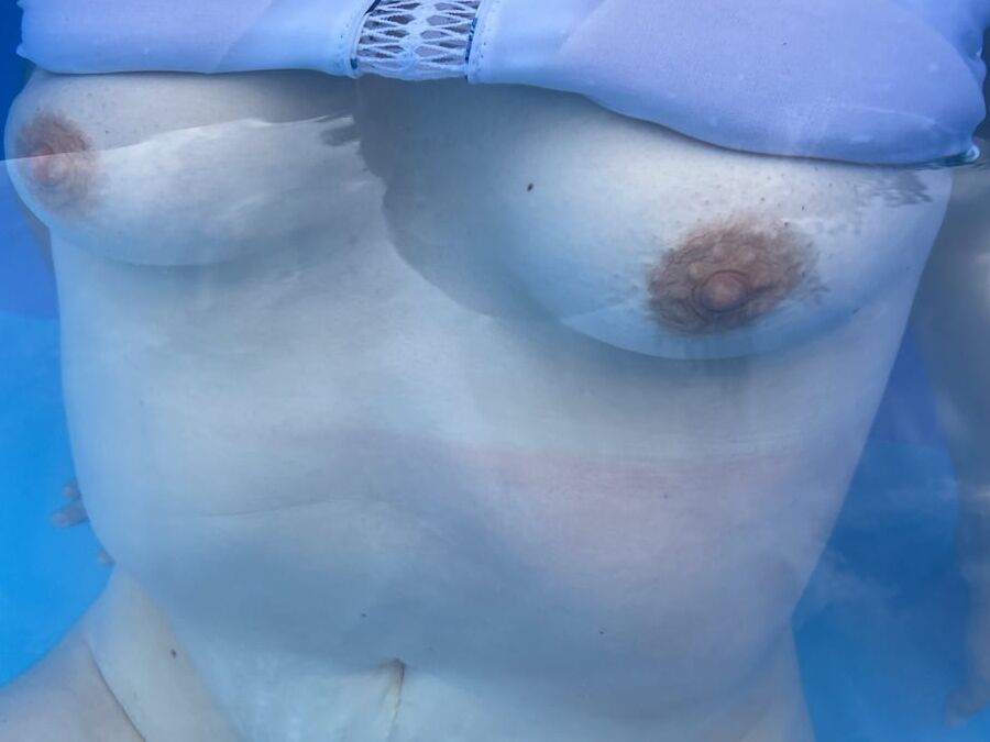 WIFE WHORE AT THE POOL