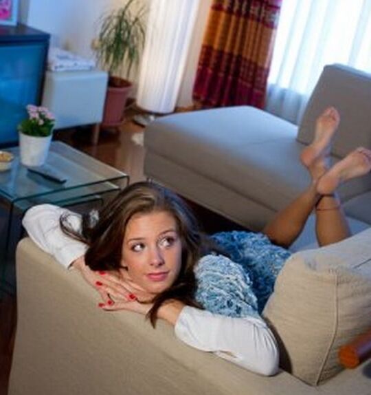 Sexy feet in prone position. Belly down feet up.