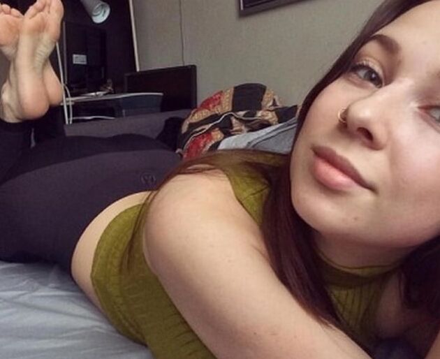 Sexy feet in prone position. Belly down feet up.