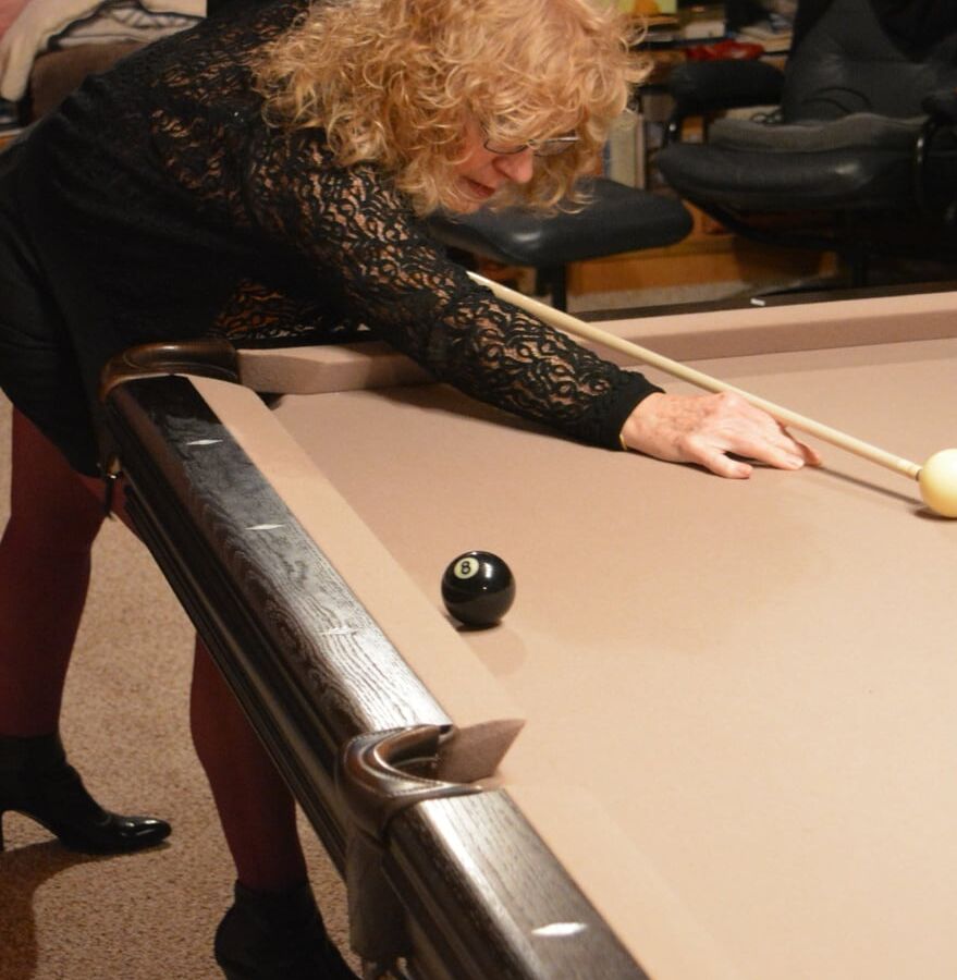 Playing pool in Purple Bustier