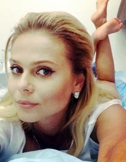 Sexy feet in prone position. Belly down feet up.
