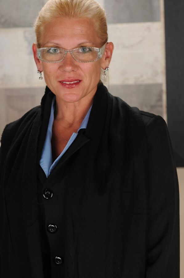 Mature blonde with huge breasts