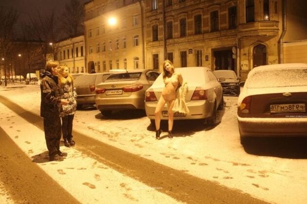 Naked blonde at winter streets