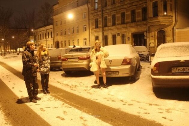 Naked blonde at winter streets