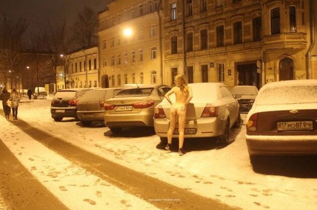 Naked blonde at winter streets