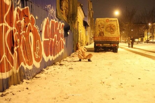Naked blonde at winter streets