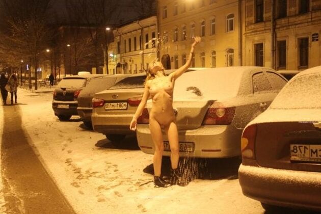 Naked blonde at winter streets