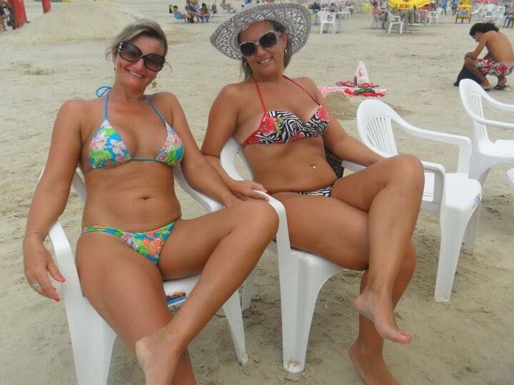 All types of women in the beach .