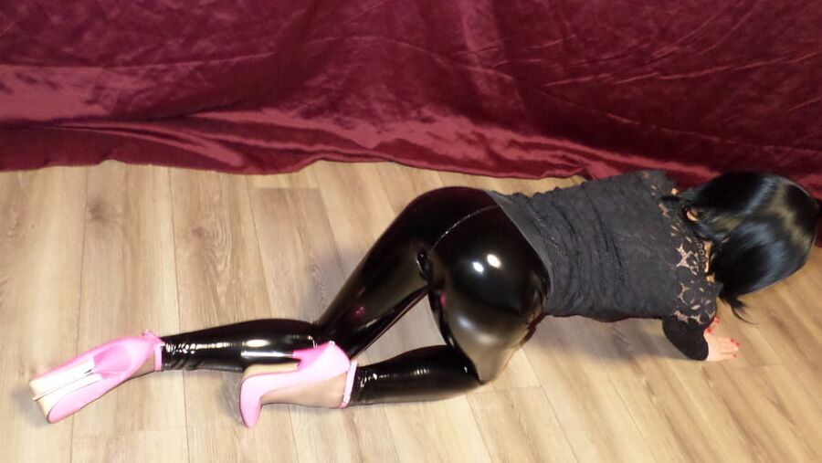 Lacquered Shiny Pants And Steel Heels