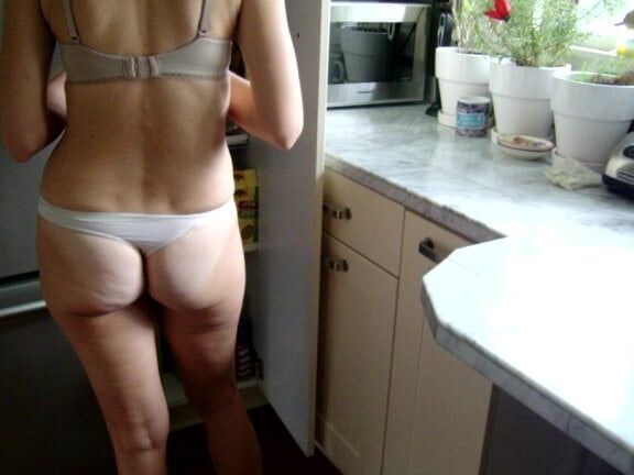 showing her tits and ass.
