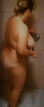 Wife naked in shower.