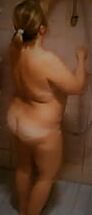 Wife naked in shower.