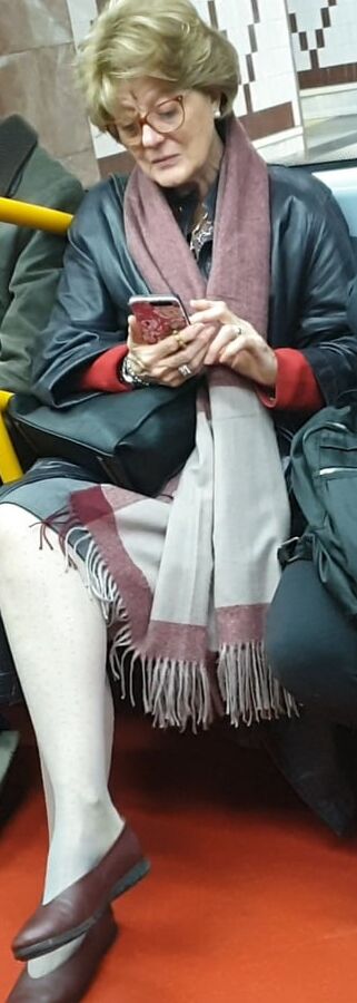 Beautiful granny with hot pantyhose .. would you fuck her?