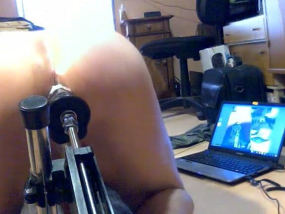 A blonde slut gets fucked by her machine.