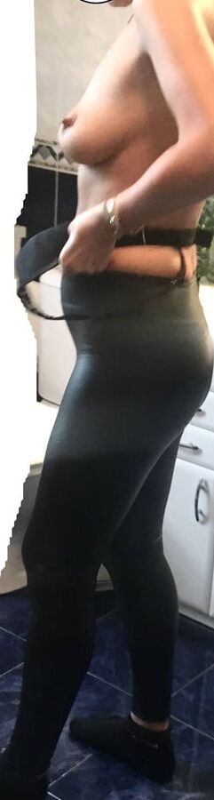 wife in black leather leggins