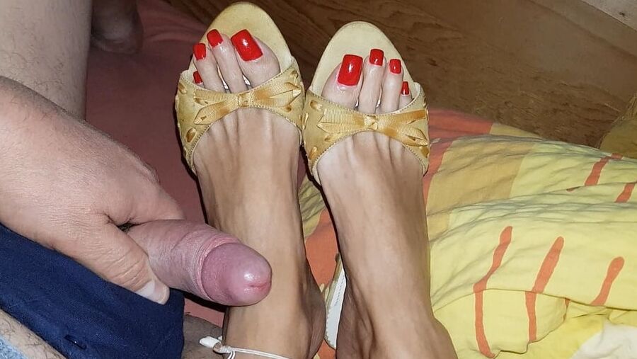 Mules and red toenails